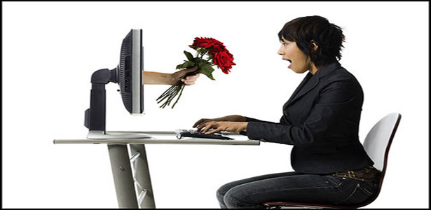 woman doing online dating handed flowers
